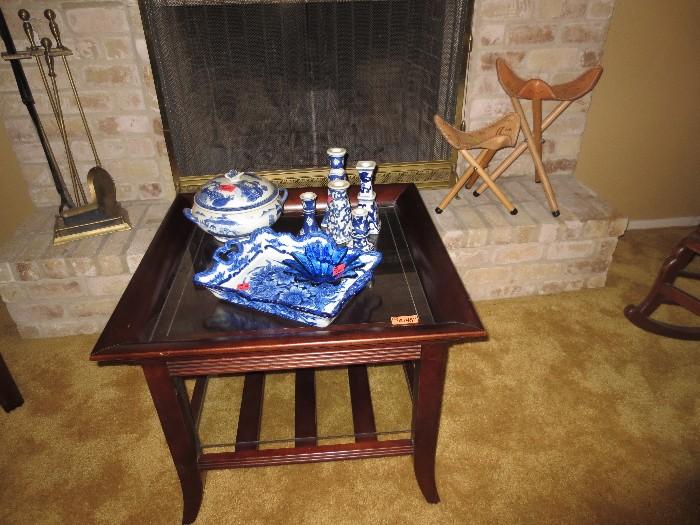 Matching wood & glass end table, blue and white ceramic wares, two leather tooled stools