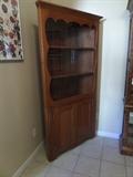AMISH MADE 3 CORNR CABINET - LOTS OF DISPLAY AND STORAGE BENETH - LOOKS CHERRY - THE CABINET IS IN GOOD CONDITION (NEEDS NEW BOTTOM DOOR LATCH)