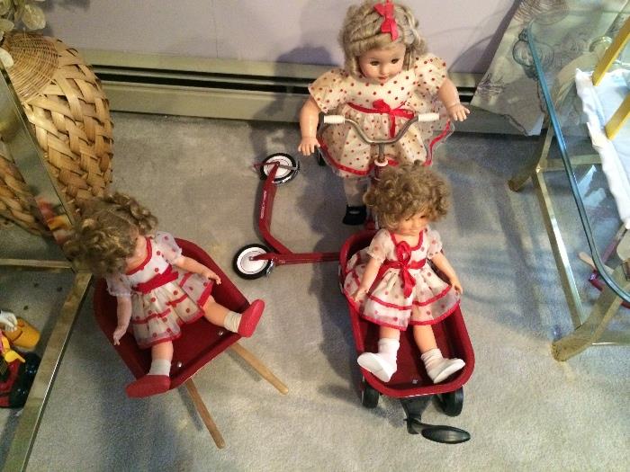 SET OF SHIRLEY TEMPLE  DOLLS WITH SCOOTERS AND WAGON