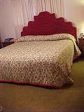 King size bed with Tufted Red Velvet headboard