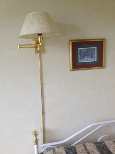 Wall mount swing arm lamp