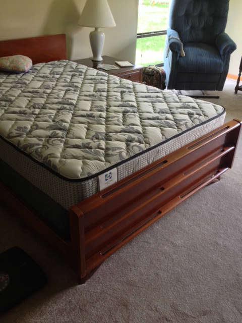 Retro full size bed shown with mattress and box spring