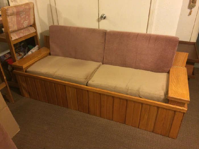 Sofa made from left over pieces from Braum's restaurants.  Very heavy duty and has storage in the removable arms and underneath.