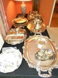 partial view of silver plate, including trays, flatware, pitchers and julep cups, trophies for Spotted Saddle Horse Breeders and Exhibitor's Association.