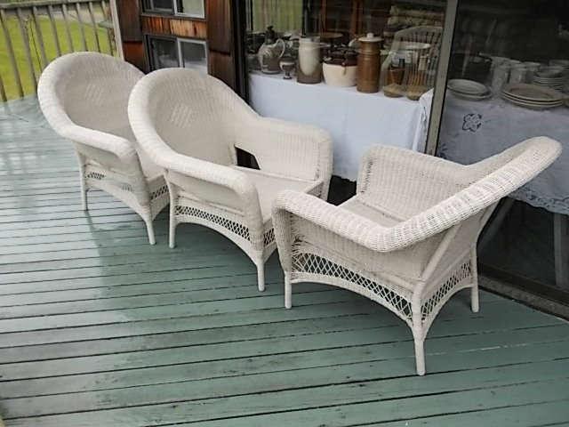 Wicker style chairs and tables.