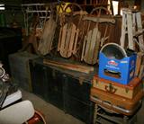 Two turn of the century baseball bats. One is handmade and one is marked "REX BATS MFRS ST JOHNS MICH".  Vintage Sleds, Barn Box and tin lined barn box.