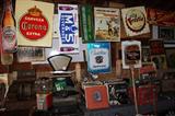 Cash Register and Hardware Scale from Ruttman's Corunna Hardware Store. Kool Cigarettes Display. Corona Beer Sign, M & S Beverage Porcelain Sign, Remington Arms Sign, Harley Davison Sign, 1970's Rock and Roll Records! Vintage Working Gum Ball Machine with key and Stand.