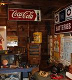 AC GM Delco Batteries large Shop Sign, Kellogg Wall Phone, Telfers Owosso Lard Can. Fenton Fire Department Helmet. Some Tobacco Tins. Some Michigan License Plates including a set of 1939 Commercial Plates. Vintage El Monitor Sugar Mill Tin Sign (US Company in Spanish).