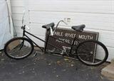 Tandem Bicycle and Ausable River Mouth Access Wooden Sign.