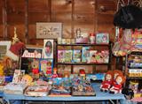 Many Little Orphan Annie items including some figures Mint in Package. Original Annie off Broadway Poster.  Vintage Strawberry Shortcake Dolls with Original Boxes.