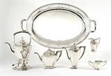1053) Tiffany & Co. Sterling Tray, 28” x 17 ½”, 135 oz.; 1054) 5 Piece Gorham Sterling Tea Service.  Estate of Elton Hoyt II 