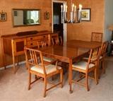 Lot 1024:  HARDEN QUEEN ANNE STYLE CHERRY DINING ROOM SET: To include table with carved legs (30'' h. x 64'' x 44''), 2 leaves (16 1/4''), 8 chairs with ivory patterned upholstery ( 2 arm chairs 38 1/4'' h. x 25 1/2'' x 22''), 4 door sideboard, center doors open to 2 drawers (30'' h. x 66'' x 19'').
CONDITION: Wear consistent with age and use.