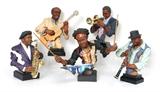 Lot 1442:  CONTEMPORARY CAST RESIN JAZZ BAND: 5 piece jazz ensemble figural busts, nicely detailed from the facial expressions to the different instruments. Drummer including sticks measures approx. 21'' x 24''.
CONDITION: The drummer has had repairs.