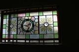 Lovely old nice-sized stained glass window with bird 