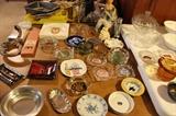 Ash trays, chalkware, dishes galore...
