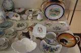 Advertising plates, bone dishes, milk glass, English and Continental painted china, cat tile trivet.
