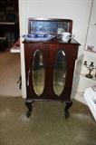 Fine and beautiful music cabinet, flow blue platter.