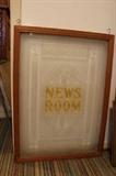 Framed glass News Room Window