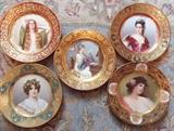 A Suite of Hand Painted Sevres Portrait Plates