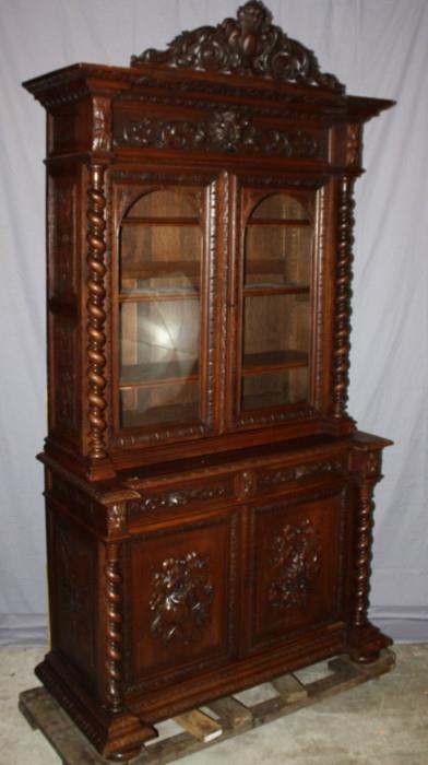 French Louis XIII bookcase in oak with carved game 