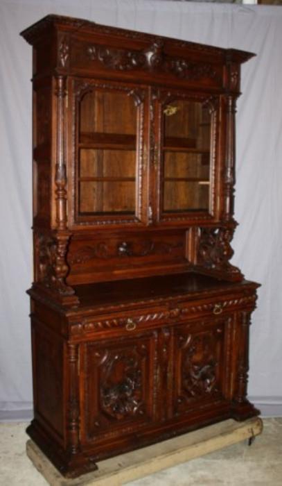 French Louis XIII buffet in carved oak with game motif