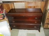1930s Lane mahogany cedar chest with bottom drawer measures 44" x 19" x 29" tall.