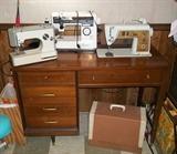 Singer Touch and Sew 620 in cabinet, plus Kenmore 158.10402 (left) and Brother VX-950 electronic sewing machine (center).