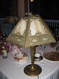 Antique, slag glass and pierced white metal overlay. Signed