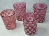 Four, cranberry and opalescent coin spot tumblers