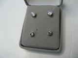 Two pair of diamond studs, one 1ct tcw.