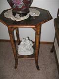 Hex table and blanc porcelain figural group