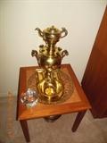 Danish teak wood end table with a tiled top. On top is a Large Brass Samovar tea coffee pot urn and tray.
