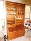 This  Teak Wood Danish ,2 piece cabinet, very nice compact desk with bookcase combination.