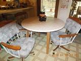 Great Dinette Set.  4 chairs, upholstered seat and back with arms and on wheels