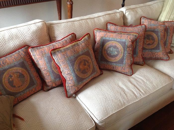Ivory Herringbone Sofa and Zodiac Pillows