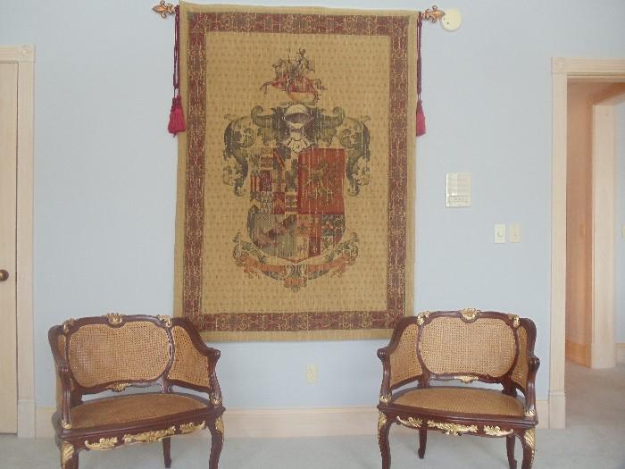 Pair of Rattan Chairs, and "Virtute et Opera" Heraldic Tapestry
