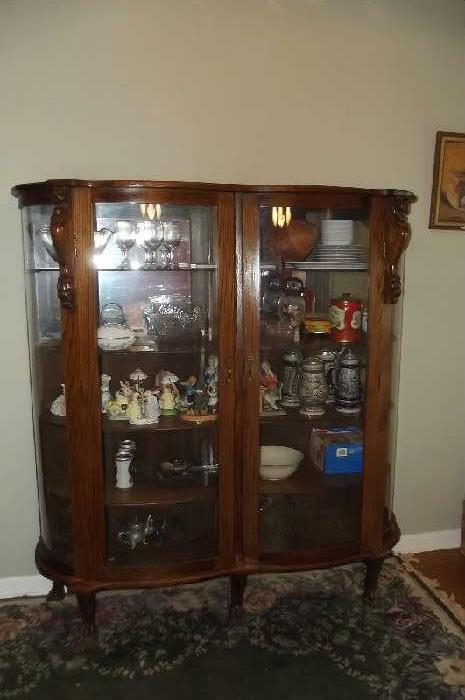 EXCELLENT CLAW TIGER OAK CHINA CABINET, DOUBLE DOORS, BOW GLASS.