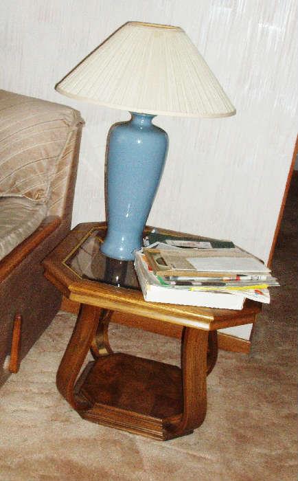 glass top end table and blue lamp