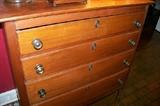 Close-up of the cherry 4 drawer chest
