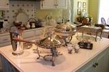 View of the kitchen - lots of nicei silverplate serving pieces