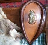 Wonderful leather horse collar which has been altered to feature a brass horse head