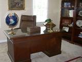 Beautiful mahogany executive desk, with a piece of glass to protect the surface