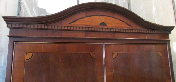Close-up of Crest and Inlay on Entertainment Center