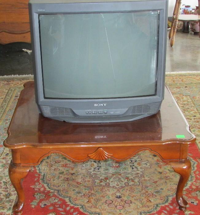 "SONY" 27" Trinatron and a Mahogany Queen Ann Coffee Table. Table is 16"tall 35" wide 35" deep 