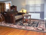 Leather Sofa, Hand Woven Wool Rug