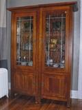 •	Pair Lighted Cabinets, Mission Inspired, Cherry Tone, Cabinet w/ Leaded Bubble Glass Doors & Thick Plate Grooved Glass Shelves Over Lower Cabinet, Antiqued Brass Pulls, Place SxS or Separate, 29"W X 22"D X 78"H