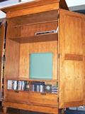 •	Media or Clothing Armoire, Mixed Wood w/ Distressed Finish, Beveled Panel Doors, Interior w/ Two Cubbies Over Two Drawers, Wide Flared Crown, Turned Tapered Feet, 56"W X 27"D X 88"H