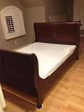 Upstairs: Sleigh bed (Queen)  comes with box spring / bunkie board $200.