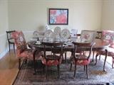 Lovely dining table with 4 side chairs, 2 leaves, and 2 upholstered king and queen chairs 