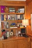 Die cast cars, antique banks, bar ware, and current hardcover books
